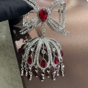 Elegant Silver and Red Gemstone Brooch
